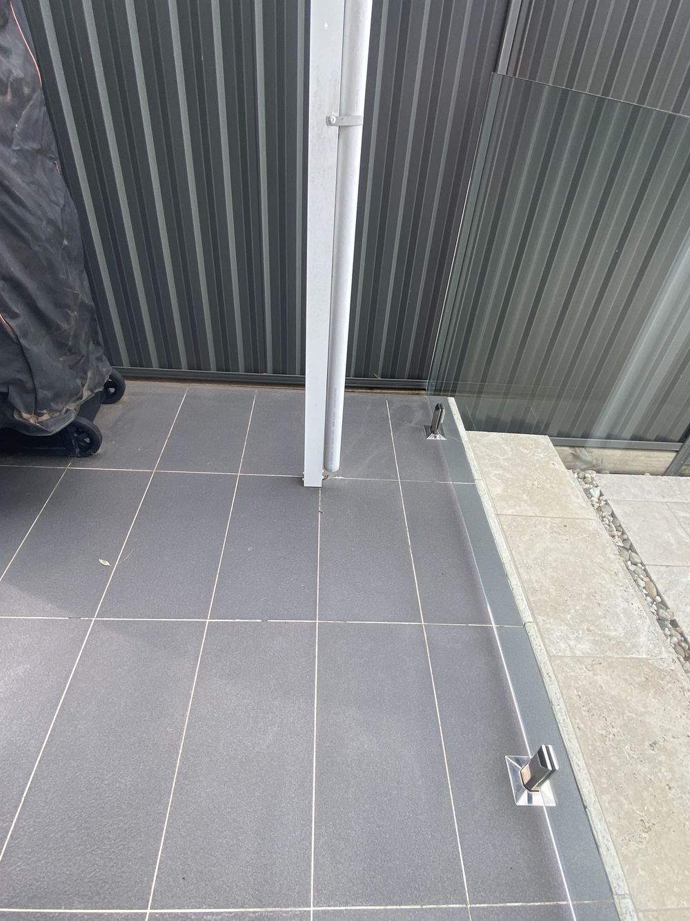 Downpipes that empty against the slab