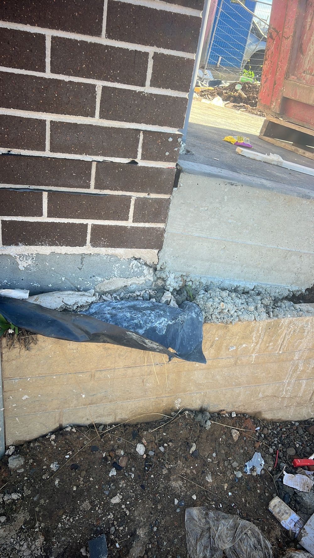 No isolation joint where the driveway meets the house slab, found during a handover inspection in Cobbitty