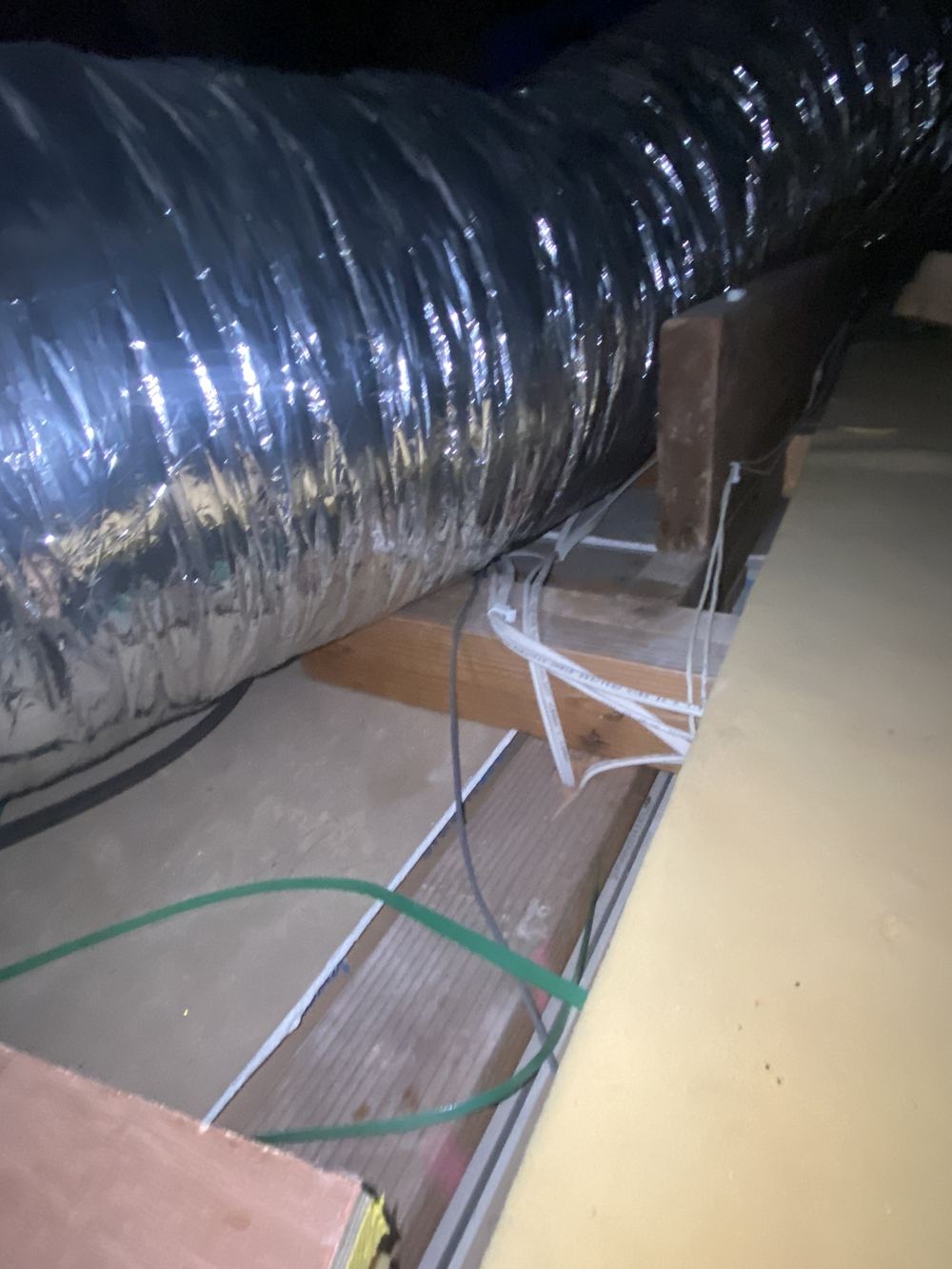 A roof space with no insulation at all