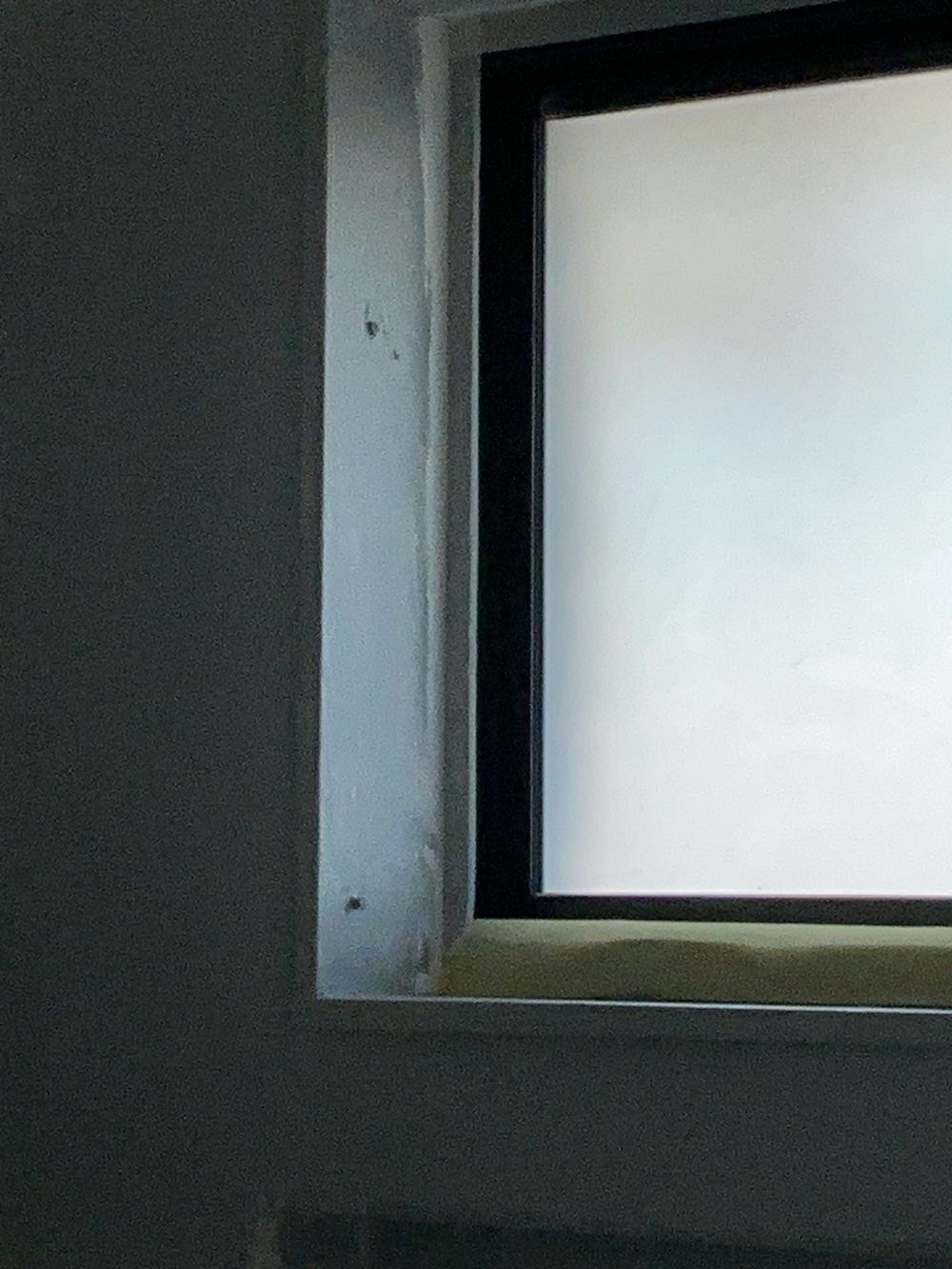 Timber reveal in a shower window, found during a waterproofing inspection in Cobbitty